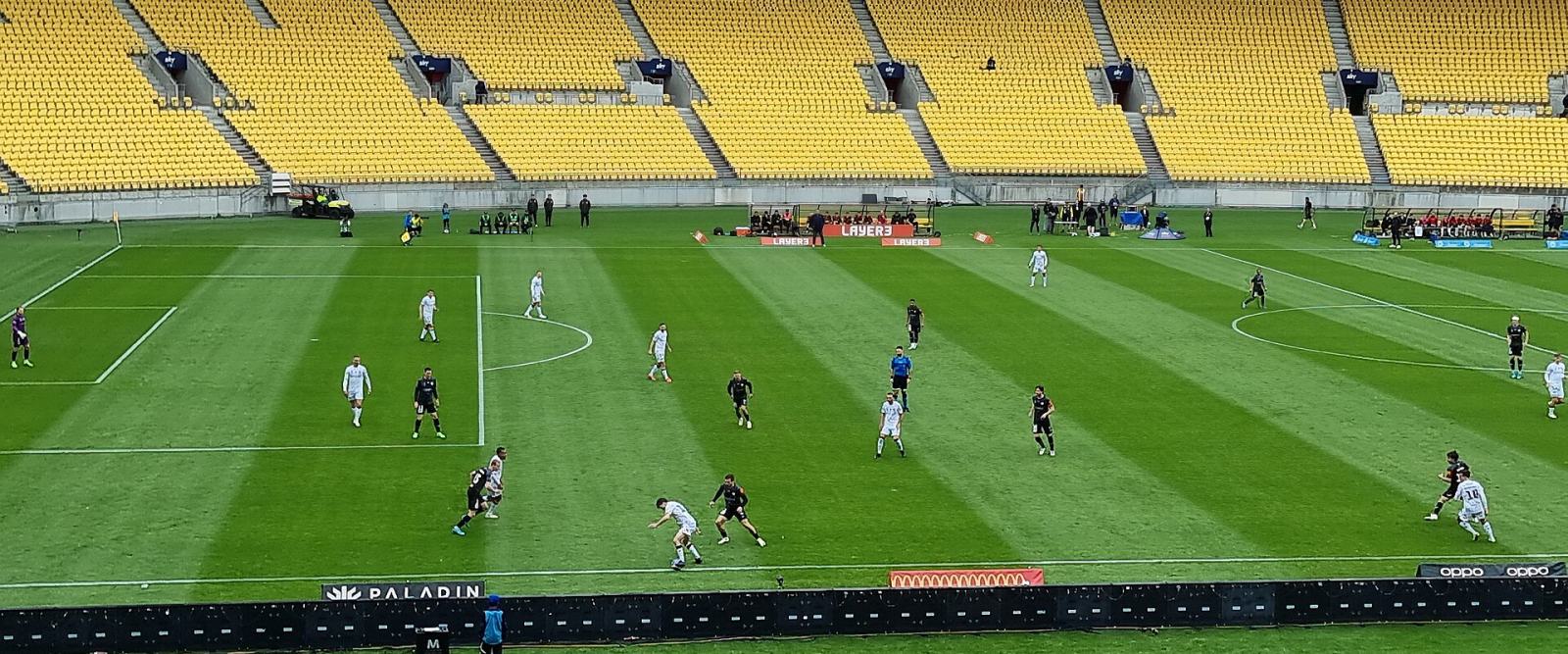 An A-League Men match in progress, seen from the stand